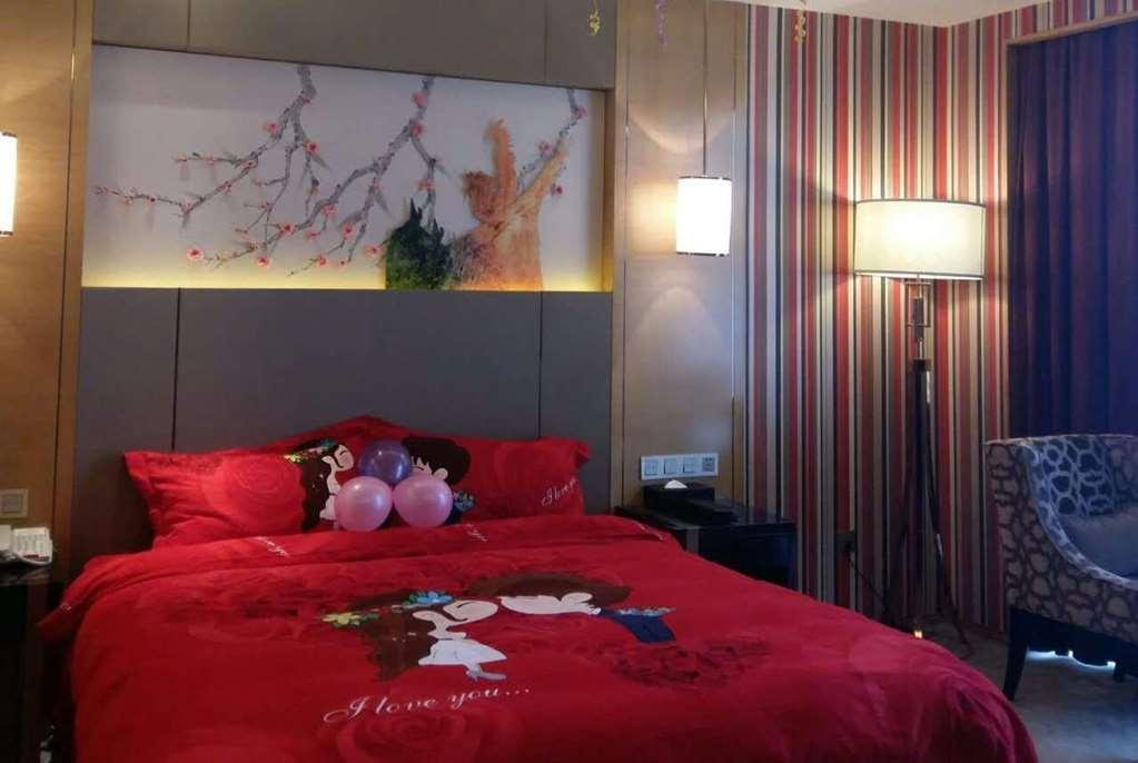ホテル Ramada Yiyang Taojiang 部屋 写真